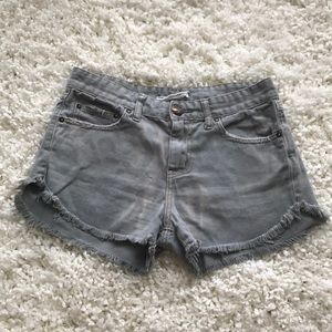 Free People faded denim shorts